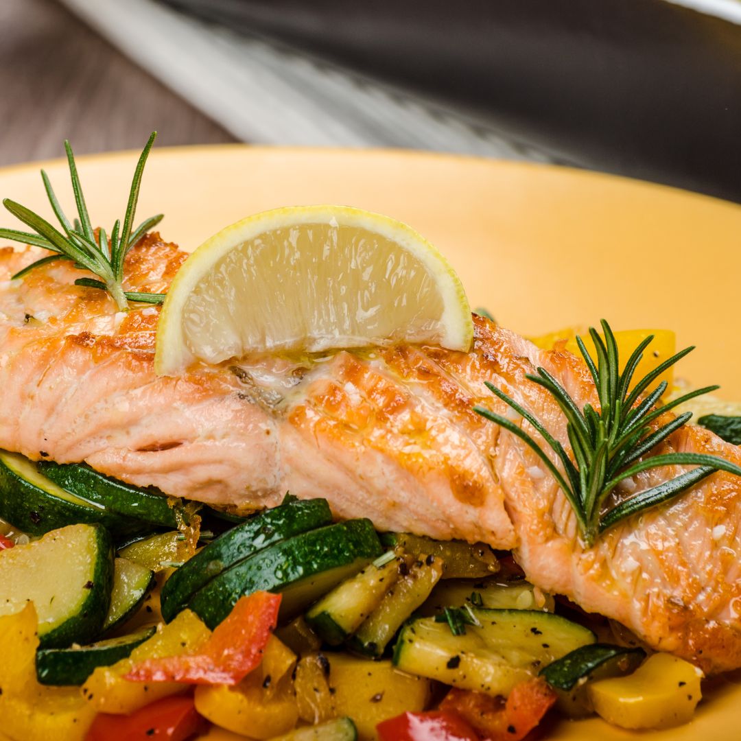 Mediterranean salmon tray bake with roasted vegetables, a high-protein PCOS-friendly meal.